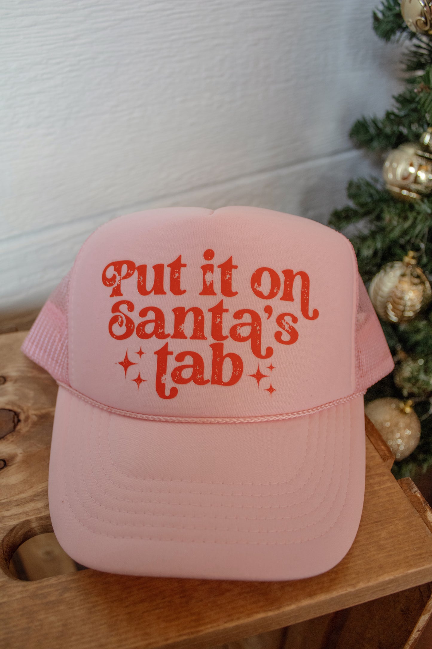 Put it on Santa’s Tab trucker hat