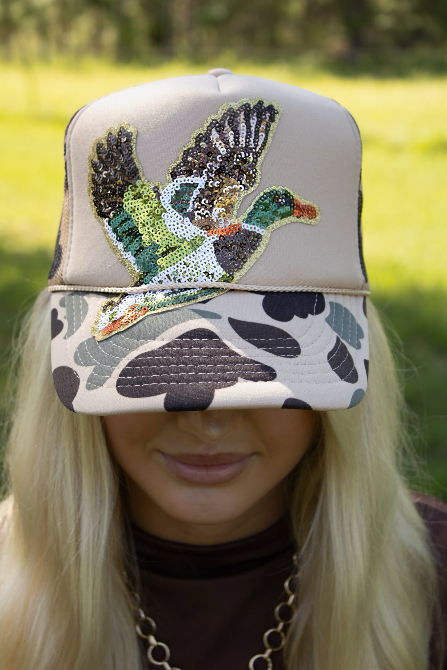 Sequin duck trucker hat